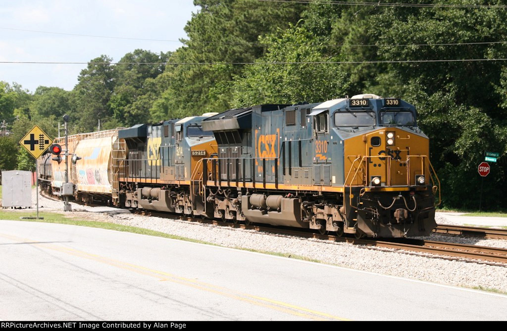 CSX 3310 and 5214 cross College St